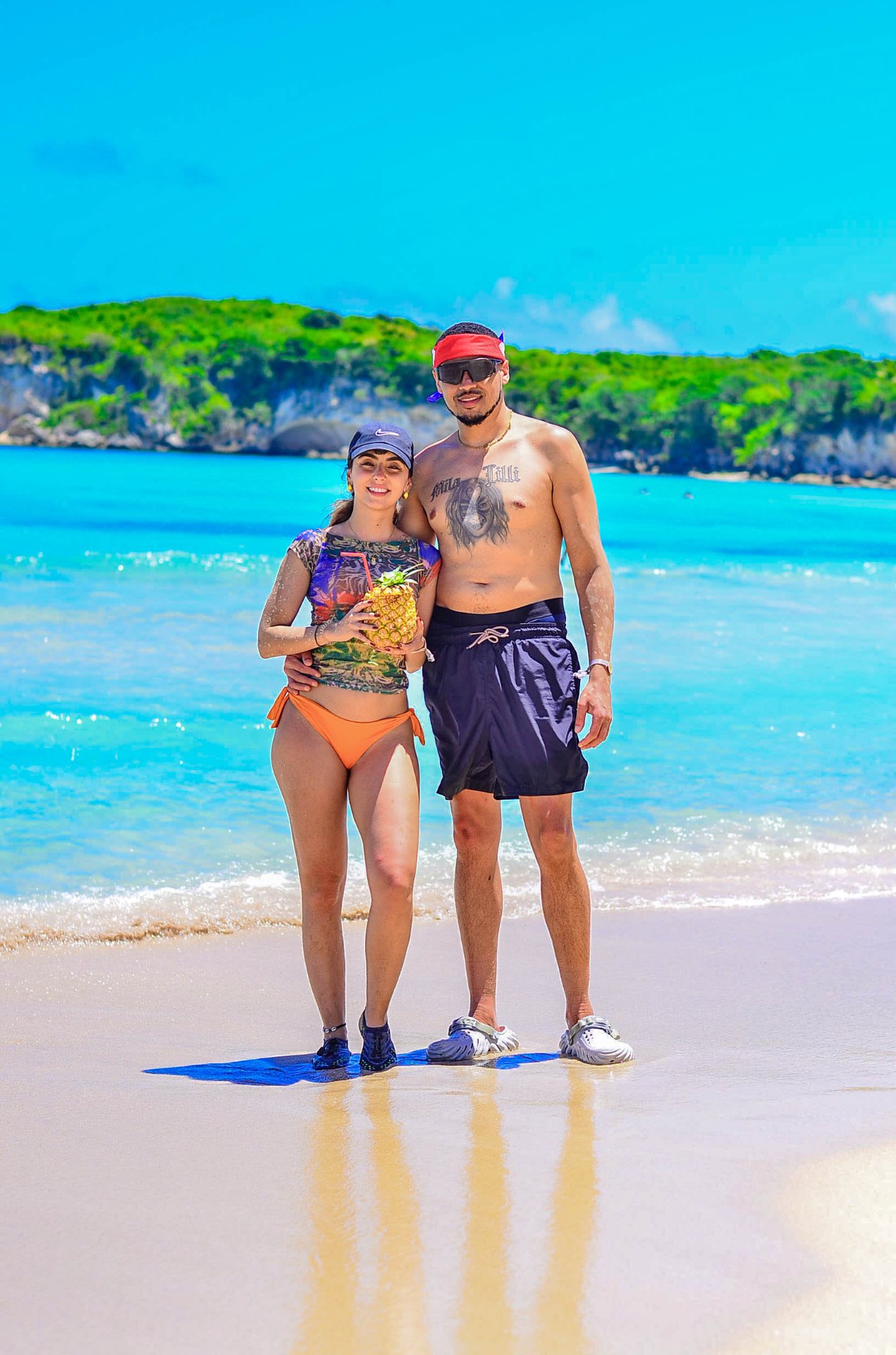 Pareja Routers en la playa